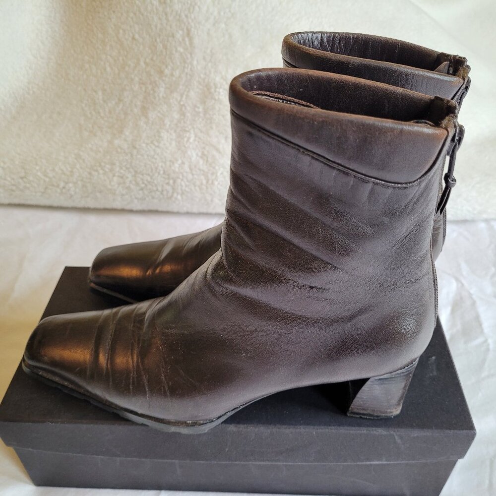Stuart Weitzman brown leather booties, size 5.5B, in good condition.
